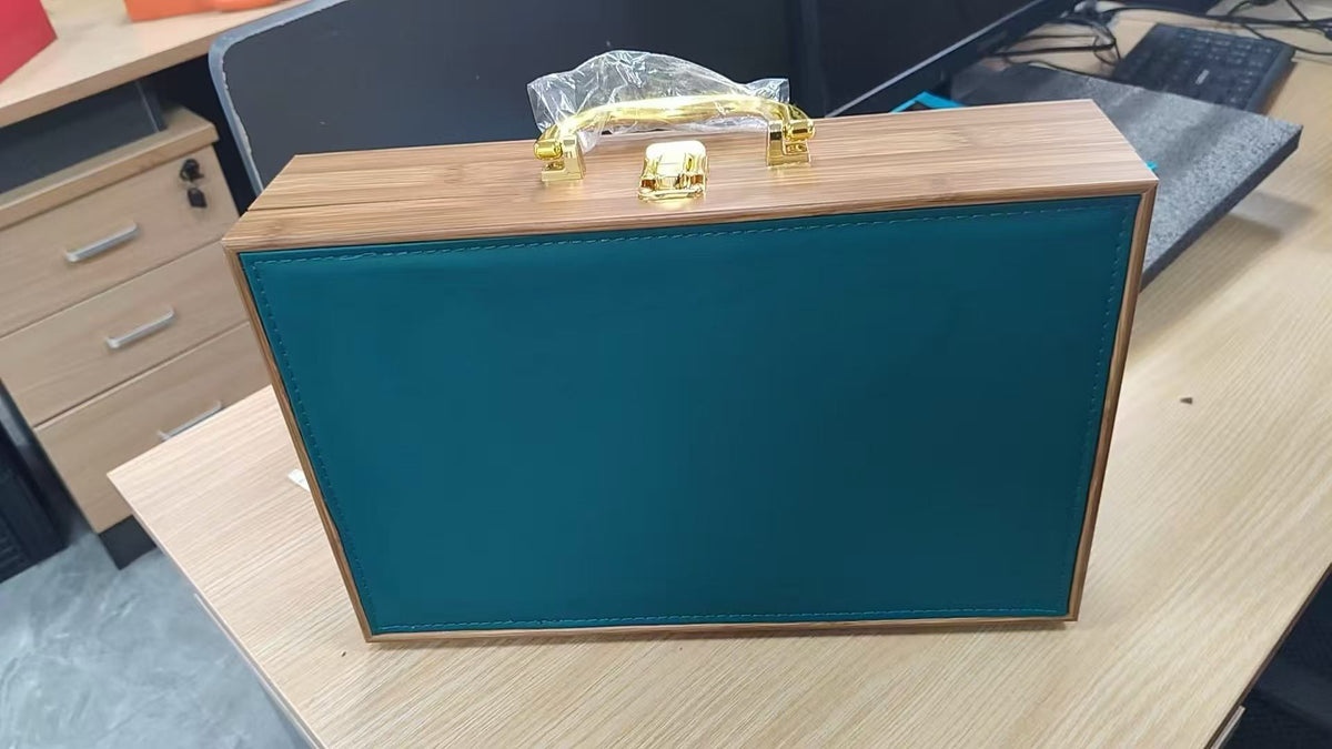 Green leather wine case with wood frame and metal clasp