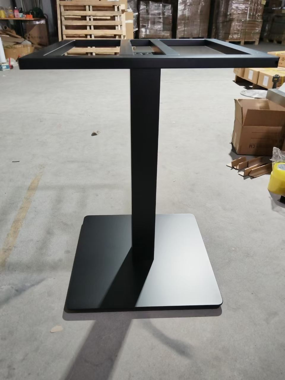 Black rectangular column table base with flat square foot plate