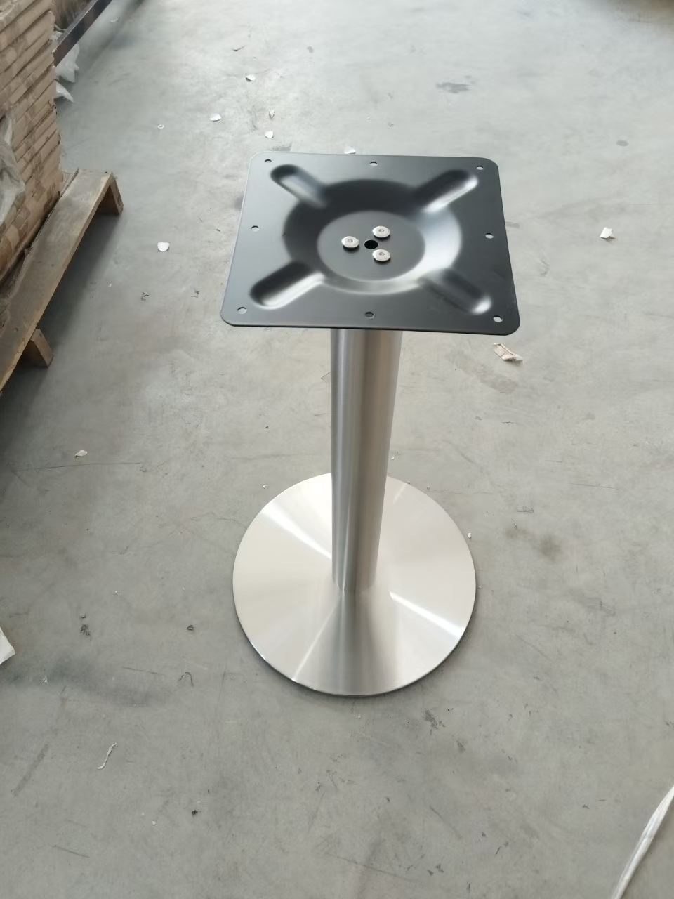 Brushed stainless steel single column table base with round foot