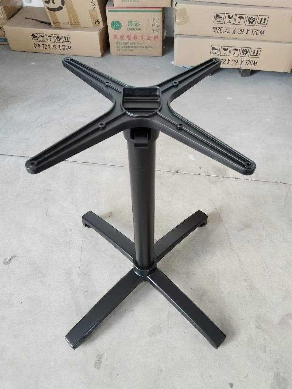 Folding table base with flip top mounting plate and folding legs