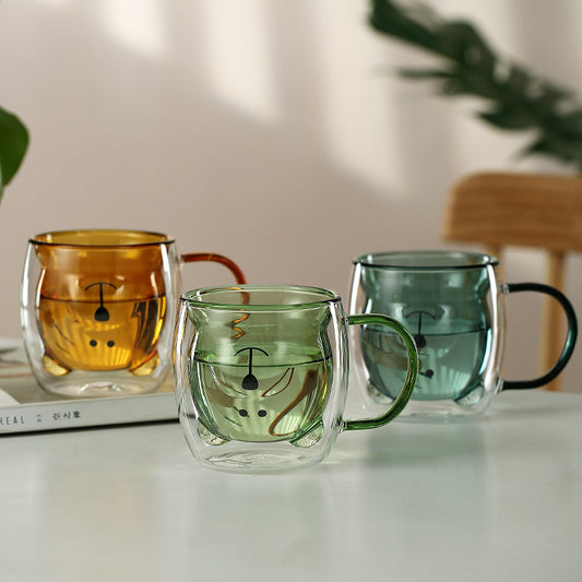 Bear double-wall glass mug with matching colored handle on white background