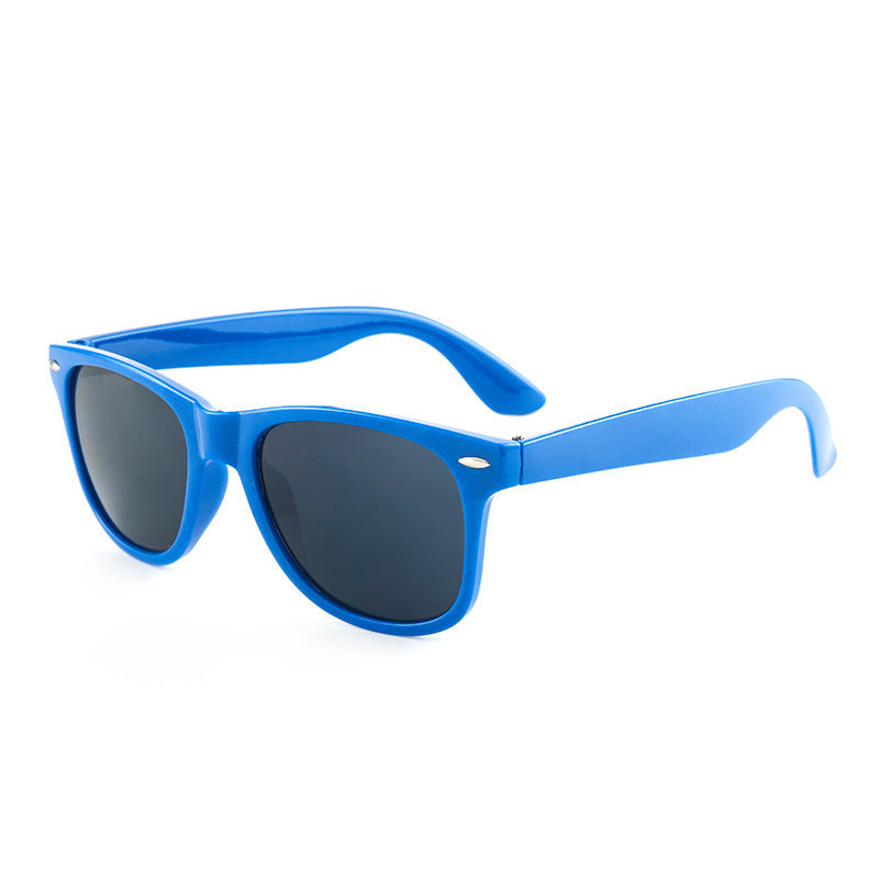 Side angle of classic plastic sunglasses with dark lenses and slim arms