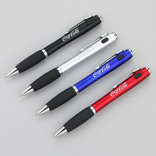 Coca-Cola LED flashlight pen with black rubber grip and red barrel