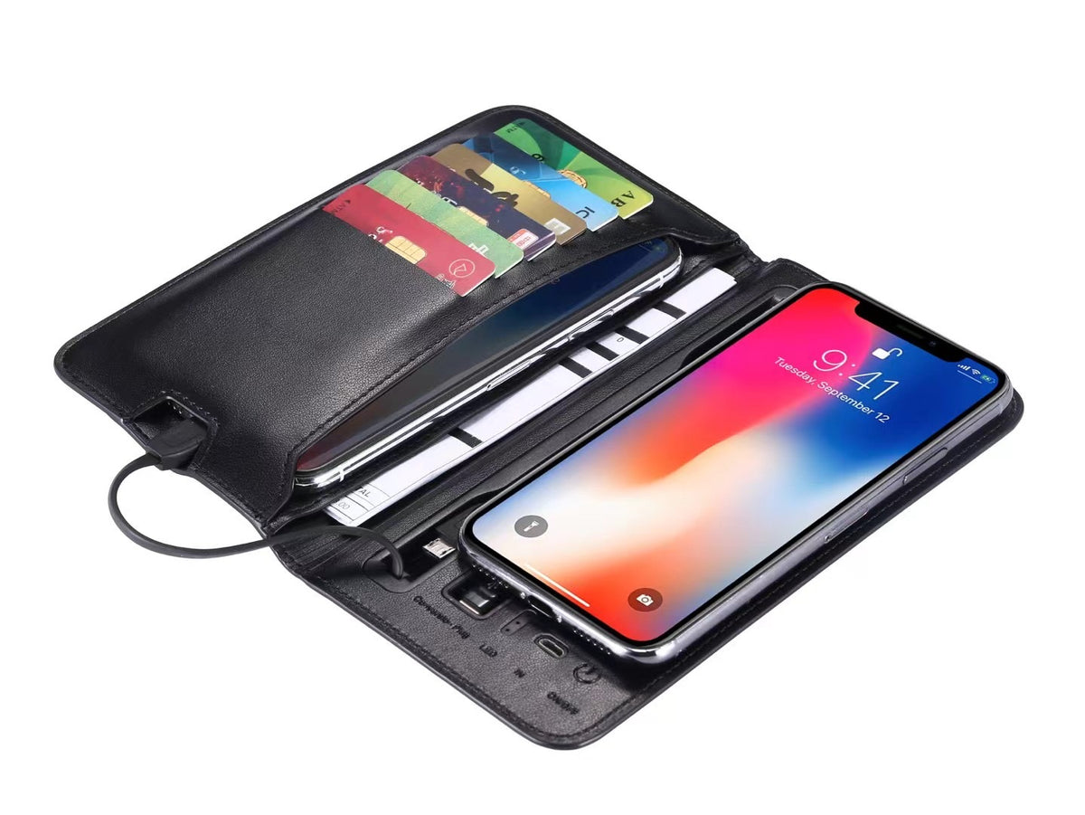 Brown leather-look multifunctional notebook with power bank on a wooden table