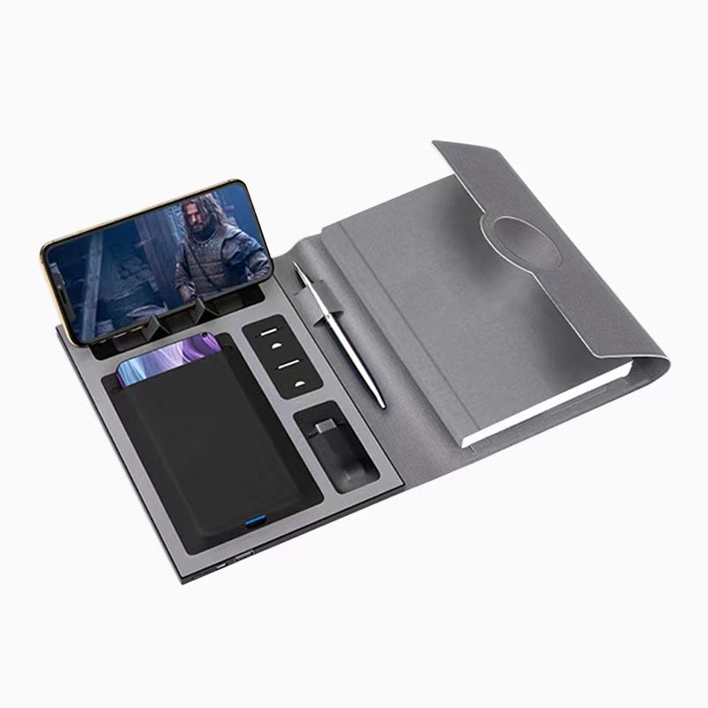 Custom branded notebook with power bank displayed in a restaurant setting