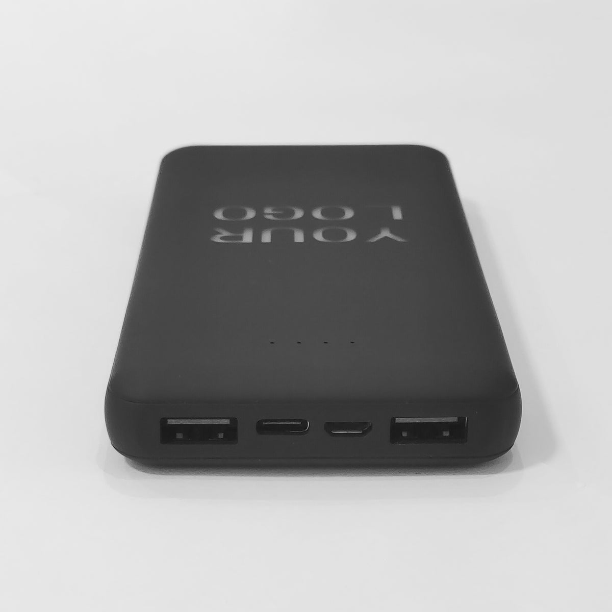 Custom rectangular power bank with LED logo and multiple USB ports displayed for branding reference