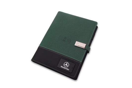 Open wireless charging notebook showing lined pages and fabric cover texture