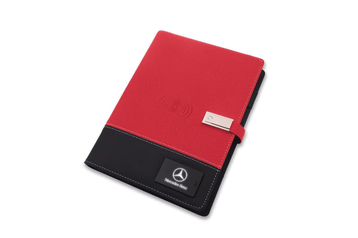 Black leather notebook with wireless charging pad and embossed logo area