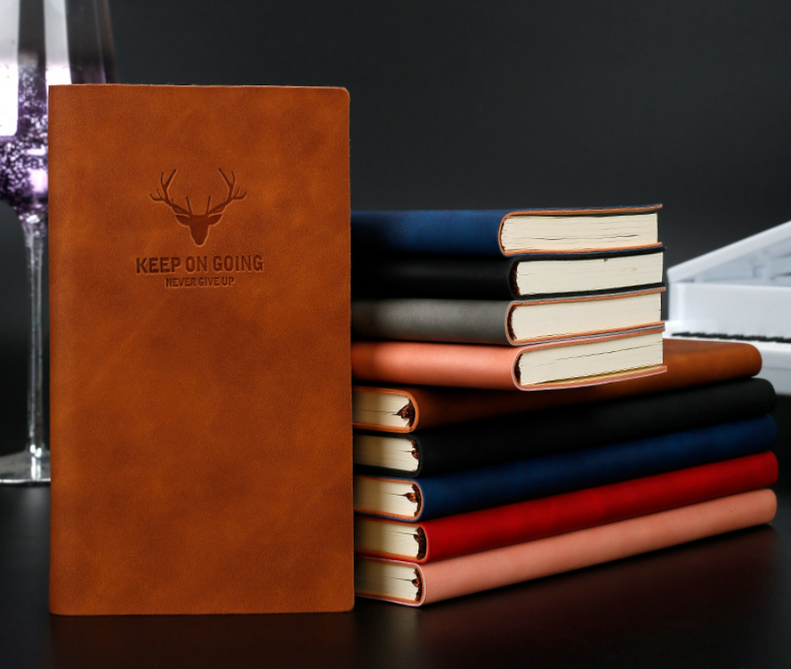 Black PU leather notebook with embossed deer-head logo on the front cover