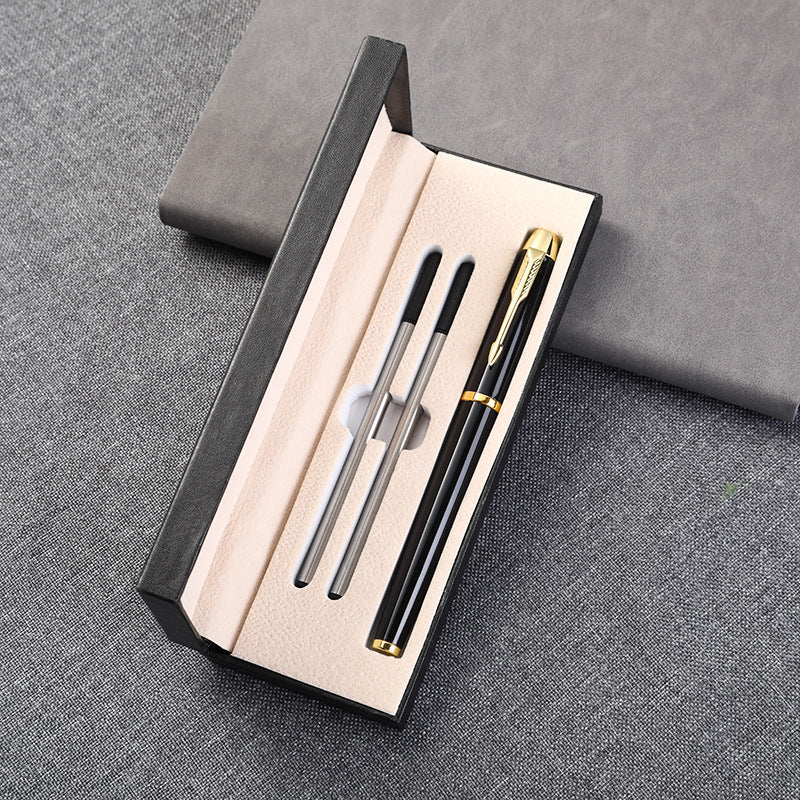 Black leather flip-top pen gift box closed with beige double pen slots visible