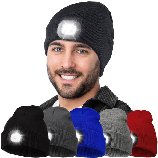 Grey knit beanie with LED light in flashing mode, worn by a model in a cafe setting