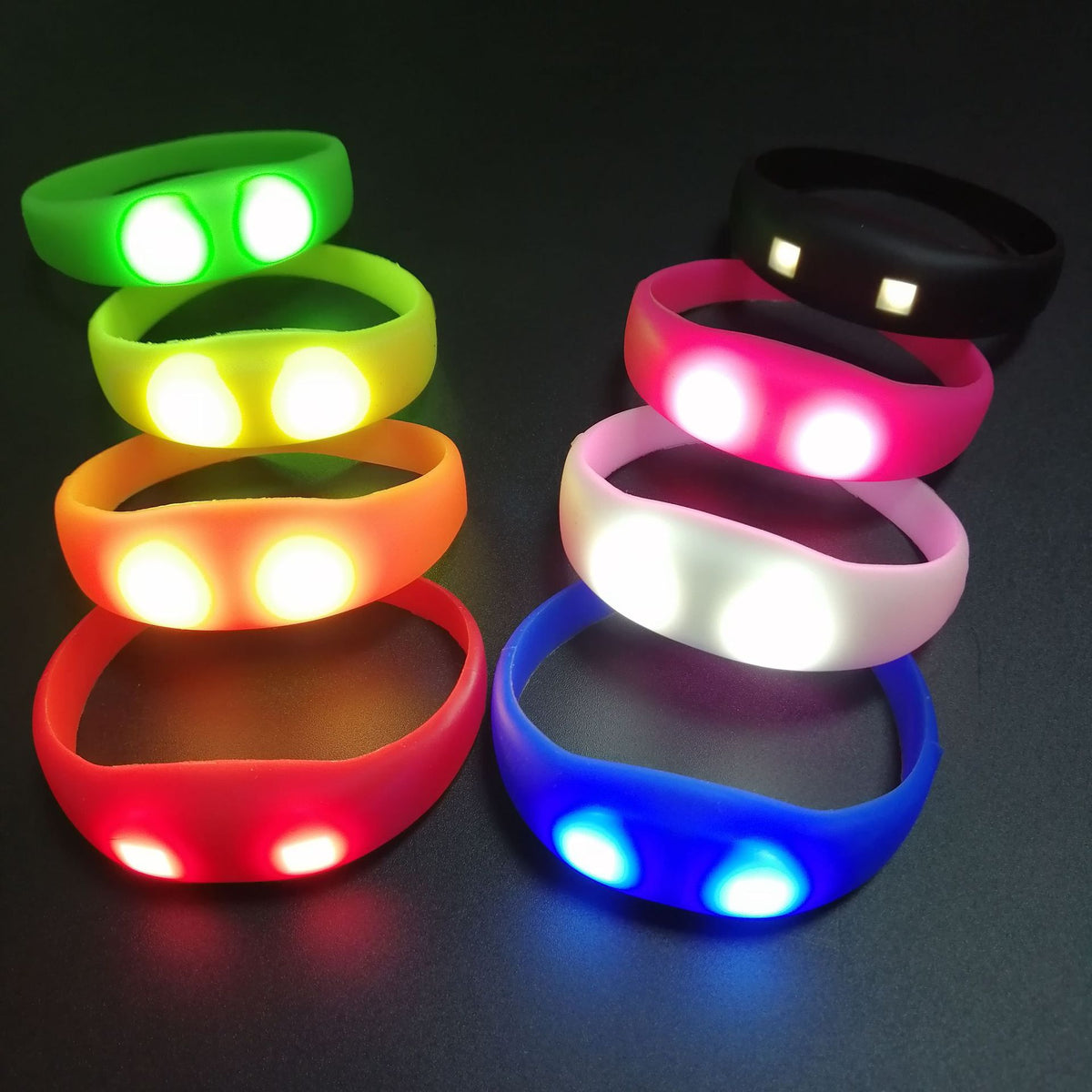 Single LED silicone glow wristband in blue with dual built-in LEDs on a white background