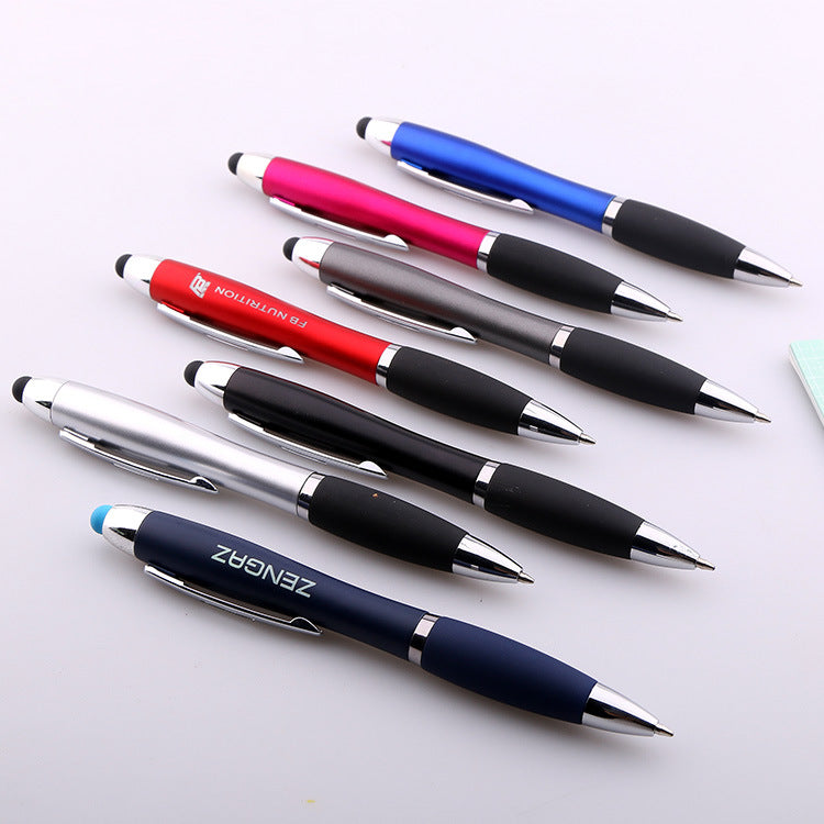 Silver metal touchscreen ballpoint pen with black rubber grip on white background