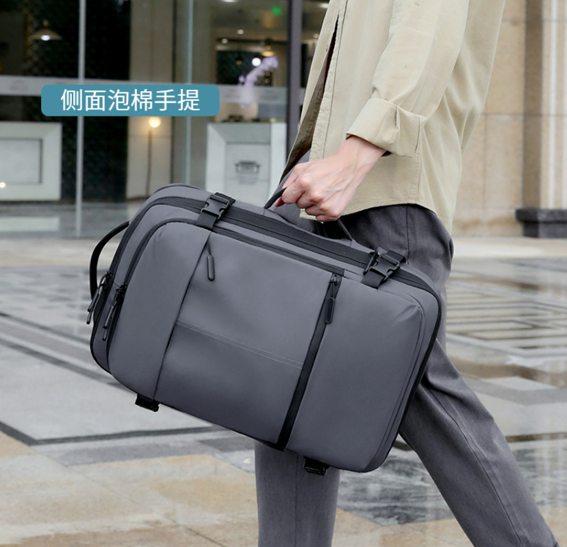 Multifunctional business backpack worn as a backpack with laptop sleeve visible