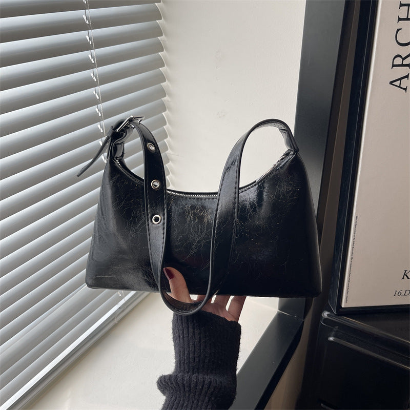 Tan smooth leather retro studded bag styled for cafe and bar use