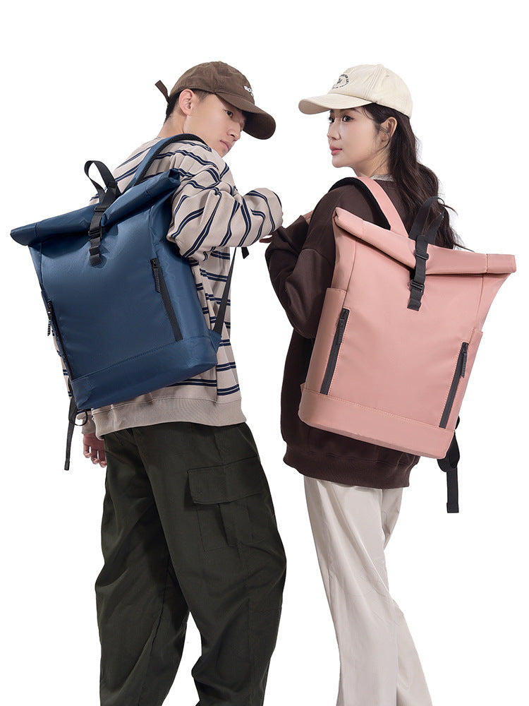 Black roll-top backpack with buckle closure and water-repellent nylon body, front view