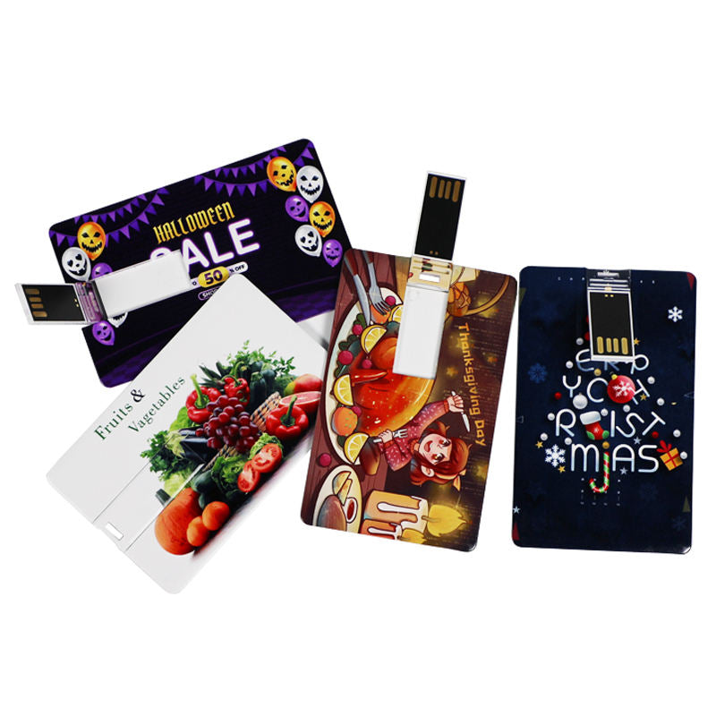 Slim card USB flash drive showing the USB connector with custom SALE tag print