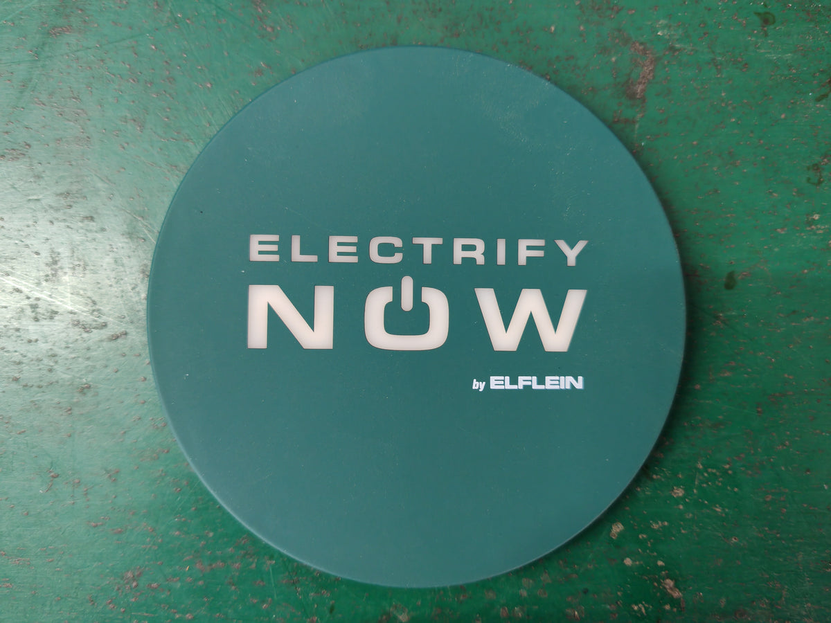 Close-up of the round wireless charger edge highlighting the slim body