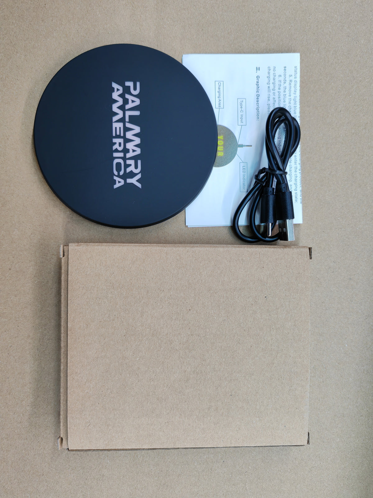 Set of LED wireless chargers with different custom patterns on a wooden counter
